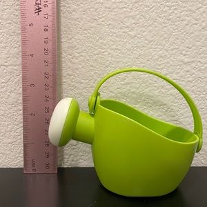 Green kids watering can toy